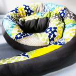 Baby-Bettrolle mit Patchworkmuster